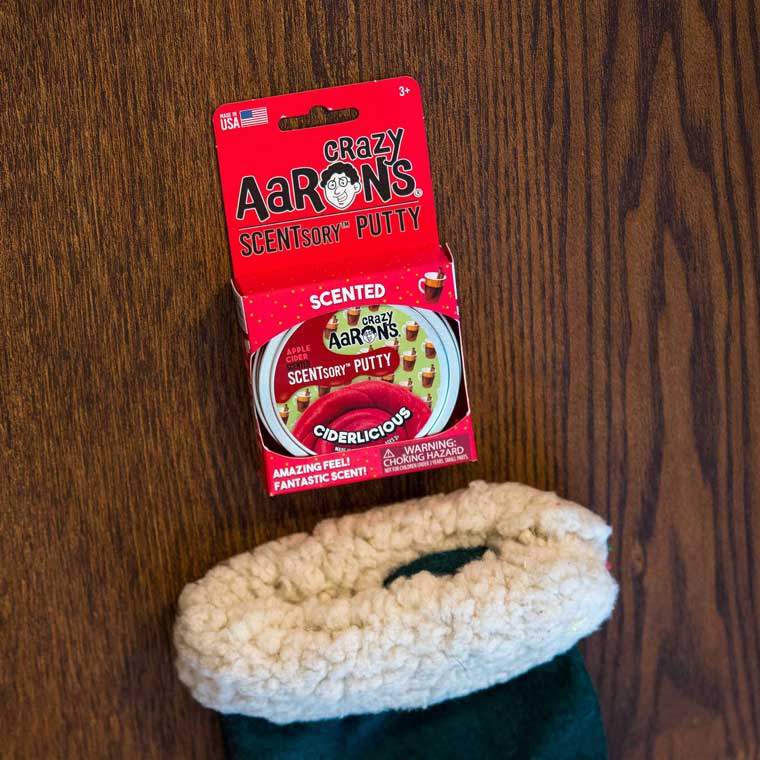 Package of Ciderlicious putty in a stocking.