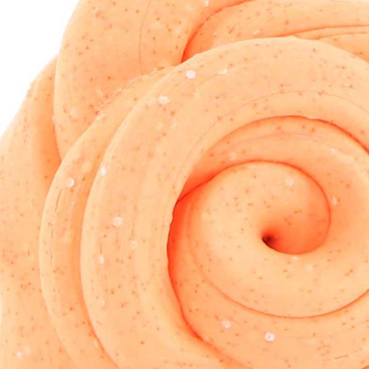 Close up texture of pastel orange putty.